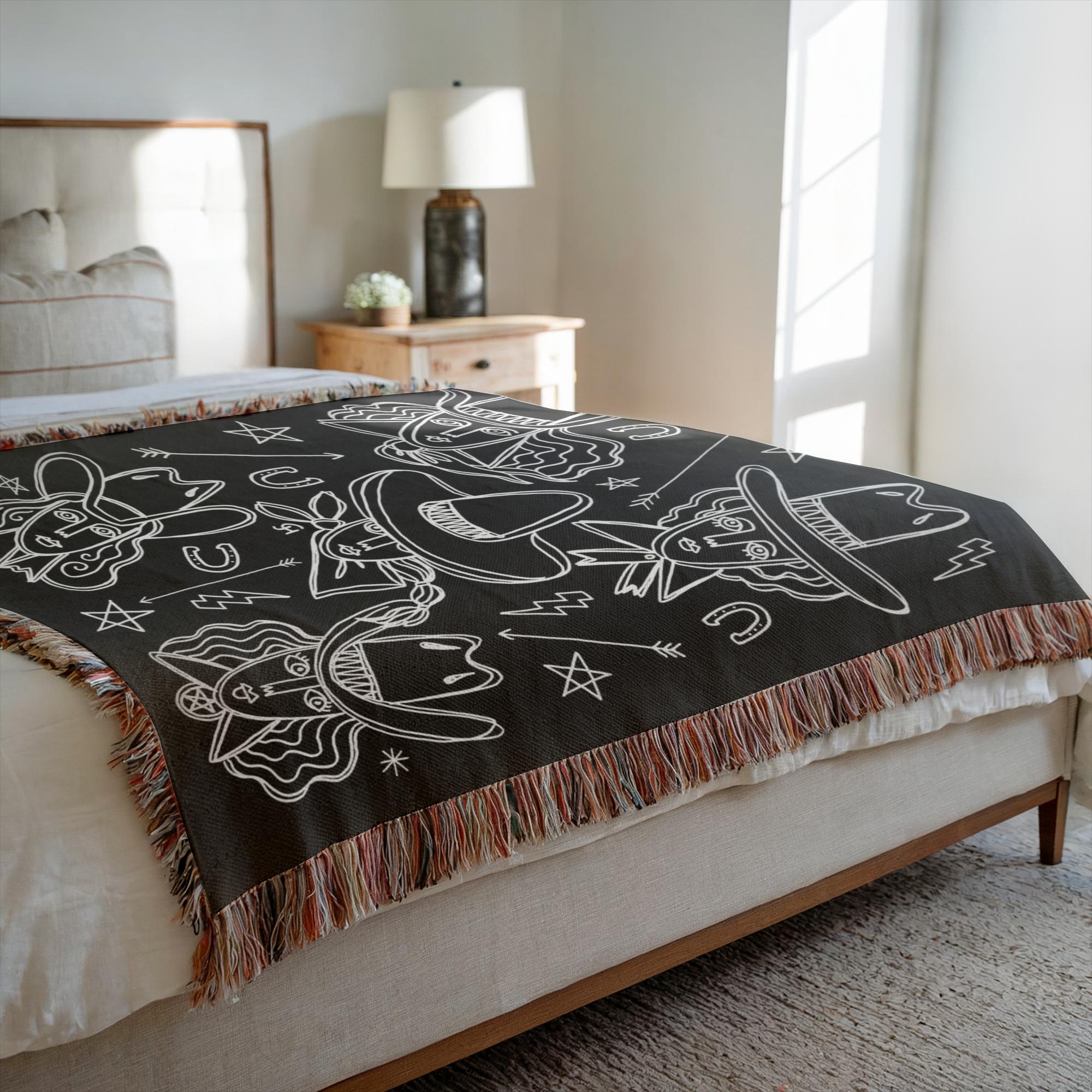 woven cotton throw with six women wearing cowboy hats